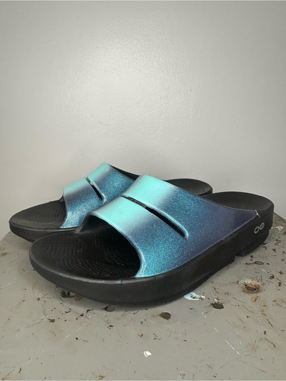 OOFOS Slide Sandals in Shimmery Teal and Blue